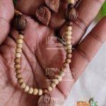 Peacock Feather Designed Tulsi Kanthi with Earring Set