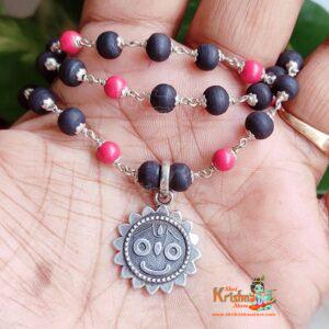 Silver Flower Capped Tulsi and Red Pearl Beads with Jagannath Pendant – Classic Necklace