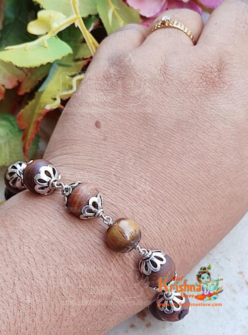 To purchase a Tiger Ball With Tulsi Beads Bracelet in Silver Cap, you can check out online stores specializing in spiritual and religious jewelry
