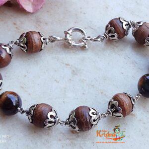 To purchase a Tiger Ball With Tulsi Beads Bracelet in Silver Cap, you can check out online stores specializing in spiritual and religious jewelry