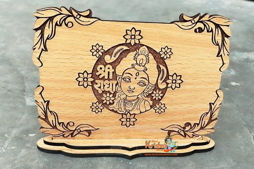 Wooden Beautiful Design Shri Radha Rani Desktop Stand – Perfect for home or office decor. Devotional and elegant. Shop at www.shrikrishnastore.com.