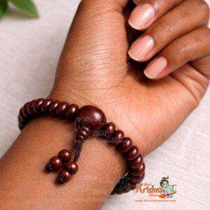 Pure Red Chandan Bracelet In Button Shaped Beads